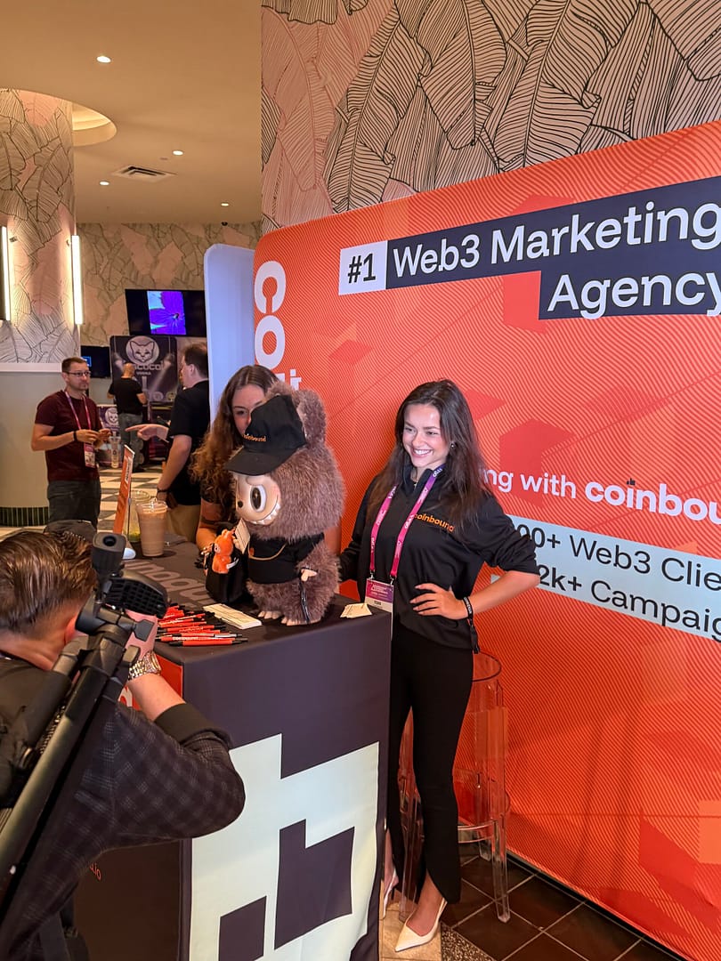 Coinbound team at conference booth